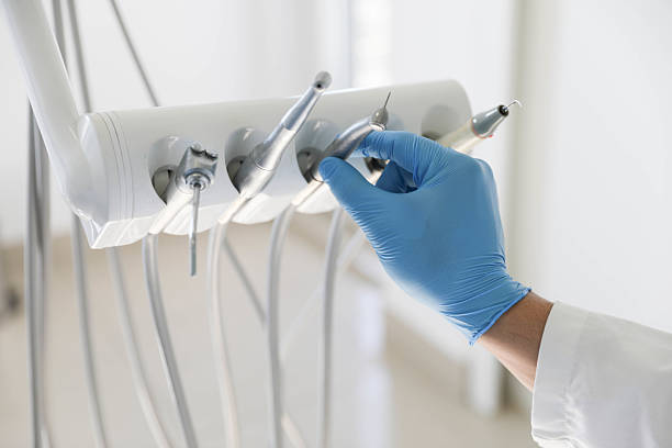 Professional Invisalign Clear Aligners technician working in Skidmore, TX